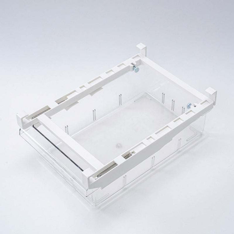 Pressure-resistant kitchen storage drawer made of durable PET, ABS, and iron with retractable design and multiple grid options for refrigerator organization