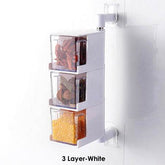 Wall-mounted Creative Multi-Functional Kitchen Seasoning Box organizing spices in a modern kitchen setting