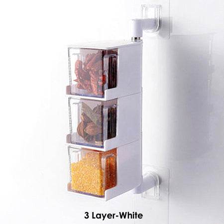 Wall-mounted Creative Multi-Functional Kitchen Seasoning Box organizing spices in a modern kitchen setting