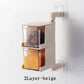 Wall-mounted Creative Multi-Functional Kitchen Seasoning Box holding spice jars and condiments in a modern kitchen