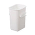 Clear refrigerator side door organizer box with snap lid holding fresh produce and condiments
