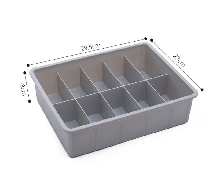 Drawer organizer tray made of durable PP plastic in beige and gray, modular design for customizable drawer storage